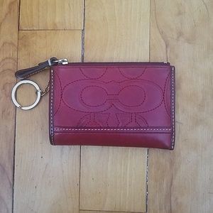 Coach skinny red leather key case.